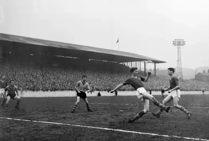 Framed Print : Leeds United vs. Wolverhampton Wanderers. Leeds centre half Jack Charlton clears