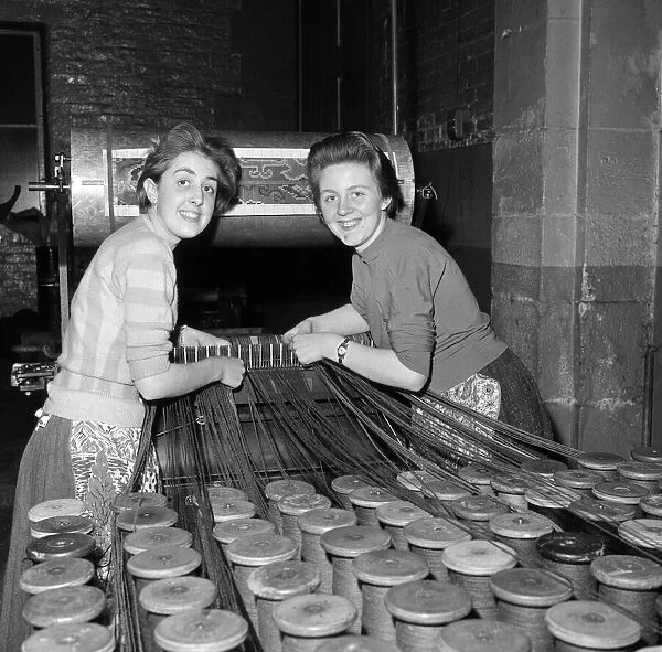Left, Dorothy Davenport aged 16 and Elaine Roberts aged 15 at Crossleys factory
