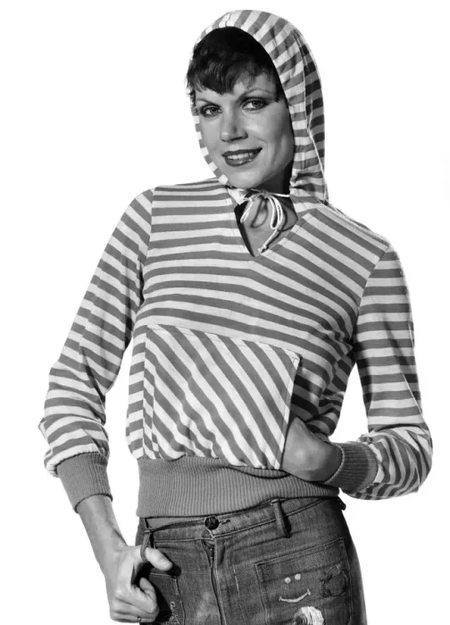 Framed Print : Left: Pink and white striped hooded top with unusual front nmuffleri pockets at the front