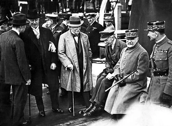 Left to right, David Lloyd George (standing, facing camera with walking stick), Gen