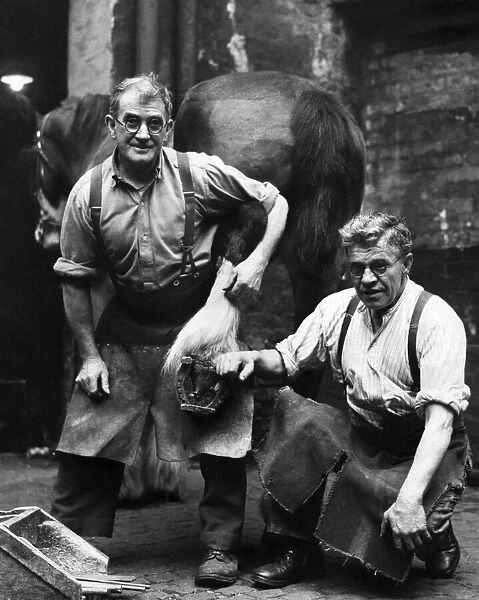Left to right. Ted Duggins and George Brockbank, who are blacksmiths. April 1948 P012321