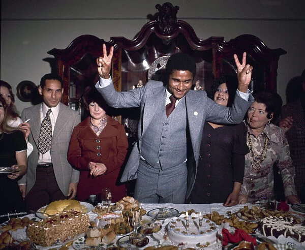 Legendary footballer Eusebio of Portugal celebrates his 30th birthday with members of his