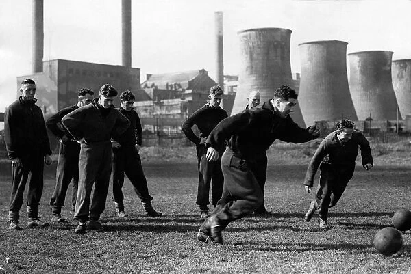 Leicester City football team pictured in a dribbling race during a training session held