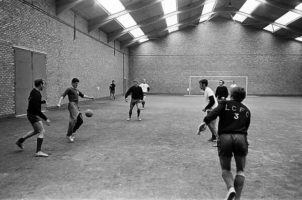 Leicester City team indoor training. Assistant manager Malcolm Musgrove with the ball