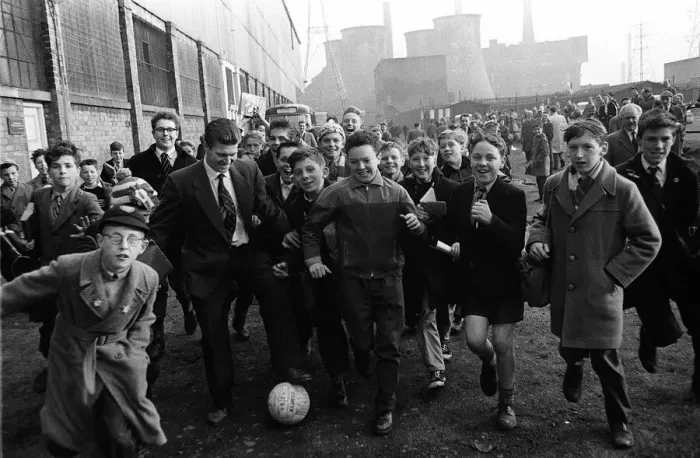 Framed Print : Leicester town folk play football before the 1961 FA Cup Final between Leicester City