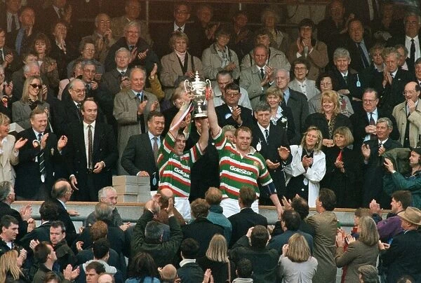 Leicesters Dean Richards holds up the Pilkington Trophy at Twickenham May 10