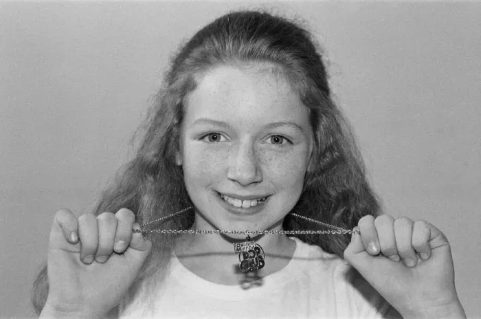 Framed Print : Lena Zavaroni wears a Daily Mirror Pop Club T-Shirt and a Daily Mirror Pop Club Pendant Framed Print : Lena Zavaroni wears a Daily Mirror Pop Club T-Shirt and a Daily Mirror Pop Club Pendant