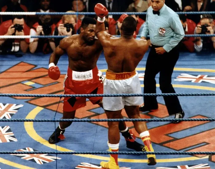 Framed Print : Lennox Lewis boxer in fight action against Donovan Razor'ruddock Framed Print : Lennox Lewis boxer in fight action against Donovan Razor'ruddock