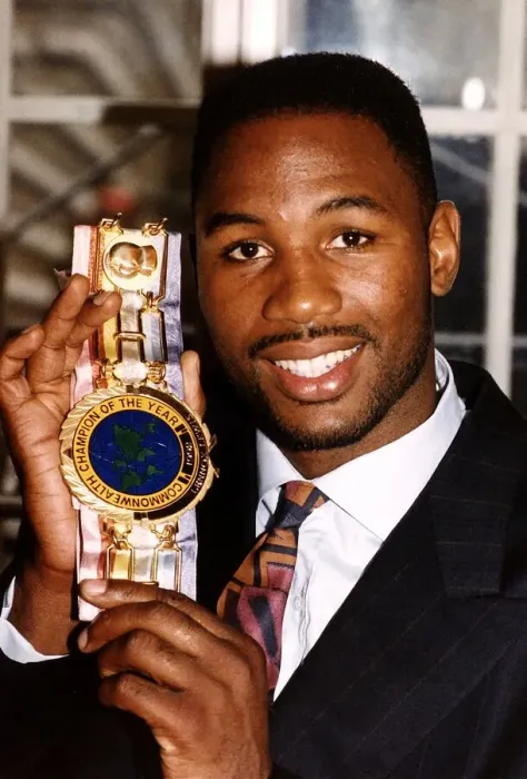 Framed Print : Lennox Lewis WBC World Heavyweight Boxing Champion showing his Commonwealth Champion of Framed Print : Lennox Lewis WBC World Heavyweight Boxing Champion showing his Commonwealth Champion of