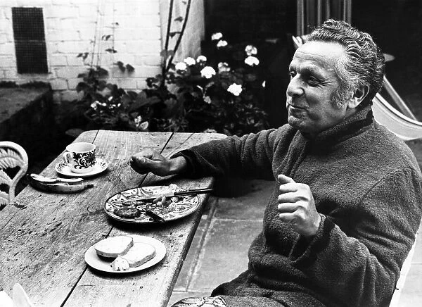 Leo Abse, MP for Pontypool, having breakfast in the garden of his home in London