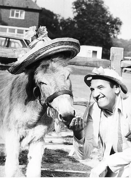Leonard Rossiter with Rigsby the Donkey he adopted July 1982