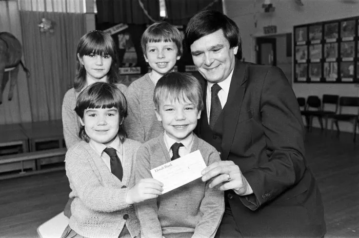 Framed Print : Lepton C of E Church school pupils present cheque for 127 to RNIB appeals organiser
