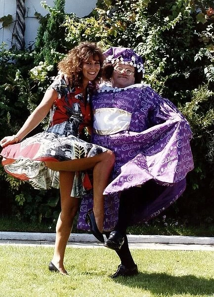 Les Dawson Comedian dressed in Pantomime Gear with Linda Lusardi Model