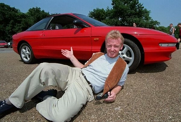 Les Dennis Comedian  /  TV Presenter December 97 Layingon ground show of the new Ford