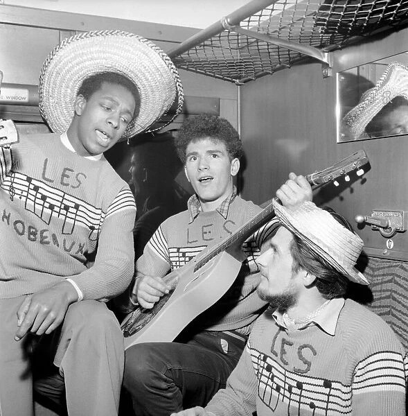 Les Hobeaux Skiffle group seen here performing on the train to Hastings. May 1957