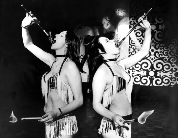 Framed Print : Lesley Hamilton and Gina Beck, a go-go dancer and fire eating act has won them a place in Framed Print : Lesley Hamilton and Gina Beck, a go-go dancer and fire eating act has won them a place in