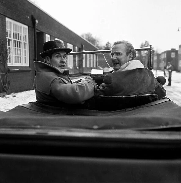 Leslie Phillips (right) takes part in a showbiz car rally