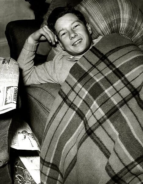 Lester Piggott, the boy jockey, is resting at his home at Lambourn, Berkshire