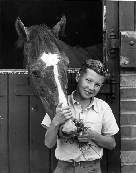 Lester Piggott, racing jockey, aged 12, who has already won his first race