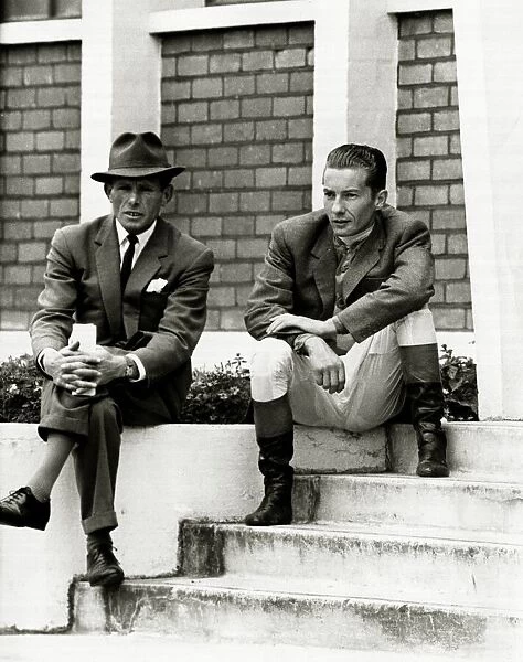 Lester Piggott sits outside the weighing-in room, chatting with friends