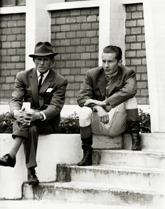 Framed Print : Lester Piggott sits outside the weighing-in room, chatting with friends