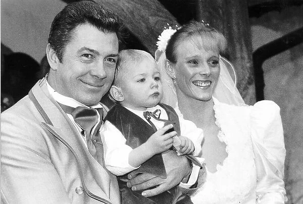 Lewis Collins Actor with wife Michelle Larrett and their 19-month old son Oliver at their