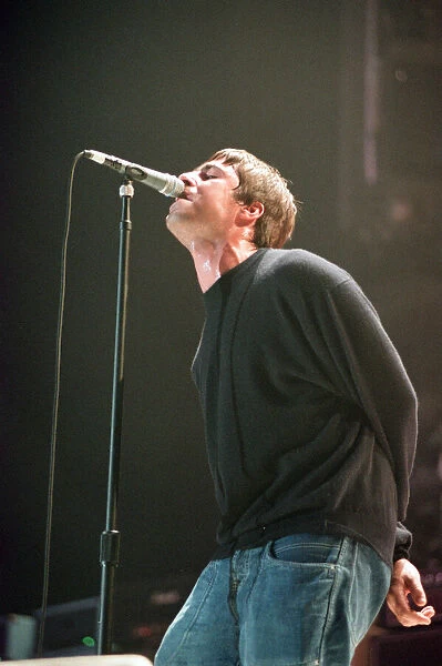 Liam Gallagher of Oasis performing at Newcastle Arena during their Be Here Now Tour