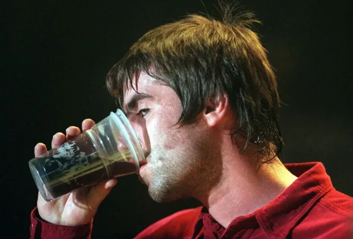 Framed Print : Liam Gallagher Oasis pop group December 1997 Drining beer from glass SECC Glasgow