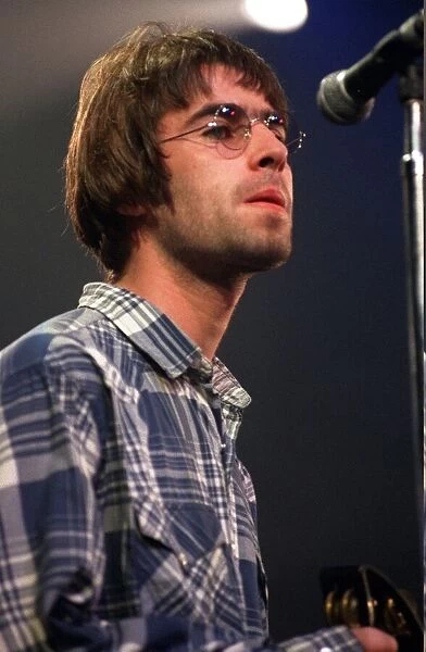 Liam Gallagher of pop group band Oasis on stage at Ingliston showground in Edinburgh