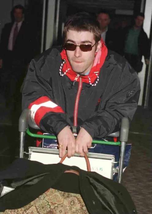 Framed Print : Liam Gallagher of the pop group Oasis arriving at Heathrow from Paris