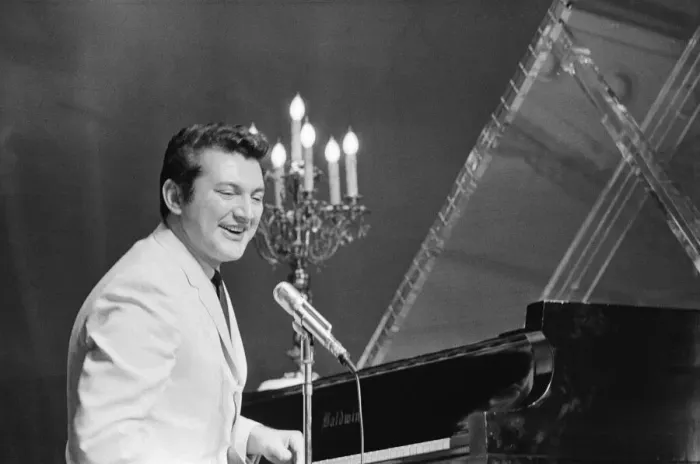 Framed Print : Liberace entertains the audience at The Royal Variety Show held in the presence of her Framed Print : Liberace entertains the audience at The Royal Variety Show held in the presence of her