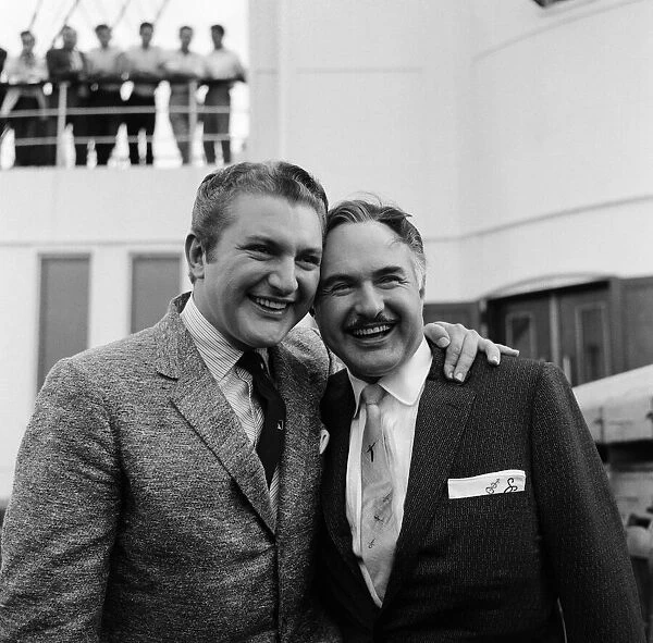 Liberace (left) with his brother George during his visit to Southampton