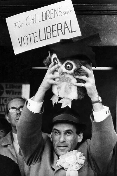 Liberal party leader Jeremy Thorpe holding a stuffed toy
