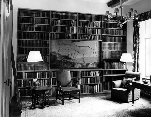 The library at Chartwell House. Inset in the bookcase is a model of the Mulberry