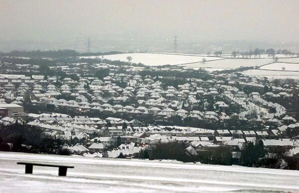 The Lickey Hills looking down over Rubery, houses covered by snow as the cold snap hits