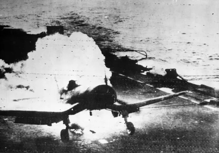 Framed Print : Lieutenant Commander Freddy Charlton lands his burning Corsair fighter on the deck of a