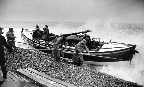 Lifeboatmen of Sheringham, Norfolk stand by during operational flights over the North Sea