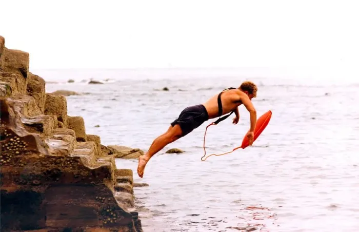 Framed Print : This lifeguard leaps into action during an exercise in July 1995 Framed Print : This lifeguard leaps into action during an exercise in July 1995