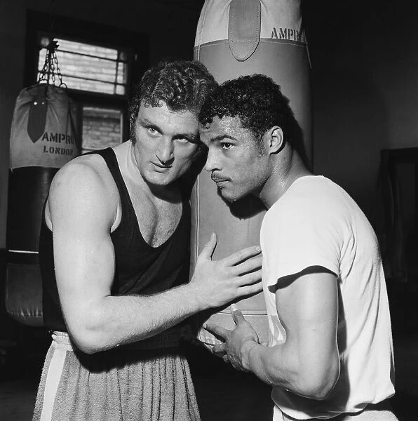 Light heavyweight boxer John Conteh (right) and heavy weight boxer Joe Bugner training