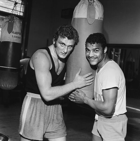 Light heavyweight boxer John Conteh (right) and heavy weight boxer Joe Bugner training