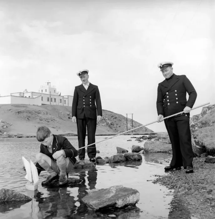 Framed Print : The lighthouse keepers and their families go about their daily duties around The Strathy Framed Print : The lighthouse keepers and their families go about their daily duties around The Strathy