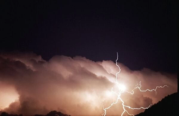 Lightning strikes from storm clouds in Umbria, Italy August 1996