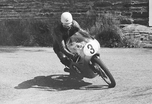 Lightweight 125cc race, Isle of Man. Jim Redman in action. 4th June 1964