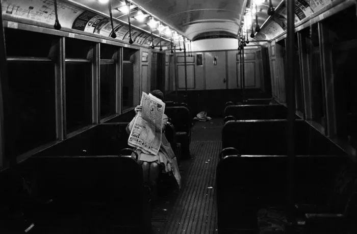 Framed Print : A limited service is ran on a underground strike day. This commuter is the only person Framed Print : A limited service is ran on a underground strike day. This commuter is the only person