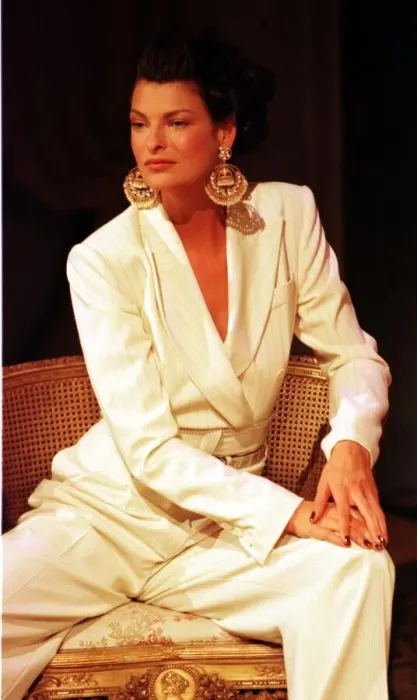 Framed Print : Linda Evangelista at Paris Fashion Week 1997 models a stunning cream trouser suit with Framed Print : Linda Evangelista at Paris Fashion Week 1997 models a stunning cream trouser suit with