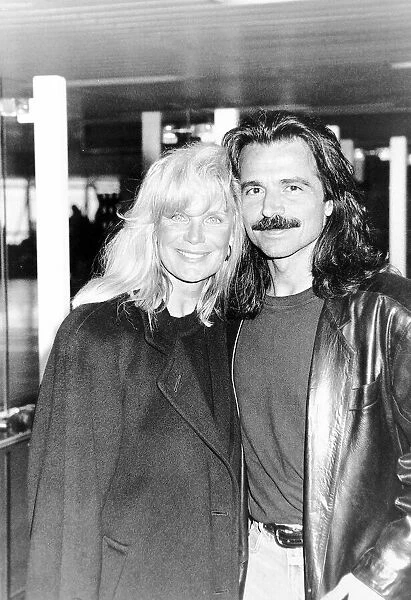 Linda Evans American Actress at Heathrow Airport with her boyfriend Greek musician Johnny