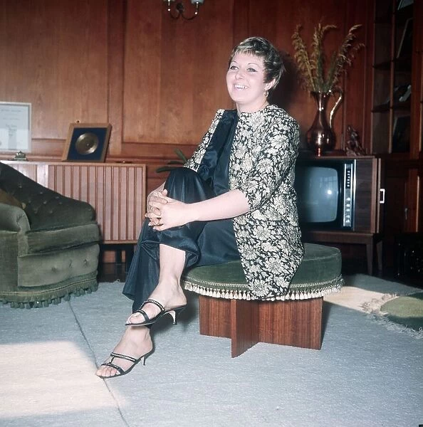 Linda Jones wife of Singer Tom Jones sitting down in the living room at their home