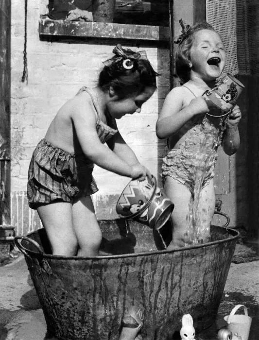 Framed Print : Linda Knott (left) and Mavis Vallance, both aged 3, enjoy a splash around in Mavis Framed Print : Linda Knott (left) and Mavis Vallance, both aged 3, enjoy a splash around in Mavis