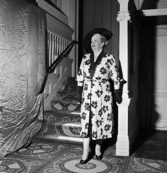 Framed Print : Linda Leigh Fashion Show. Elderly woman wearing floral patterned dress November