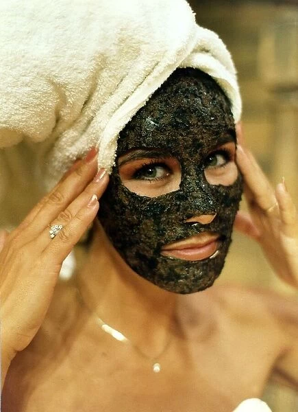 Linda Lusardi Model  /  TV Presenter wearing face pack towel on head